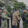 Hengky Honandar Hadiri Upacara Penyambutan Satgas Yonif 712/Wiratama