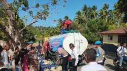 Semarak HUT Propam Polri ke-24, Polres Boltim Salurkan Air Bersih untuk Warga Desa Dodap
