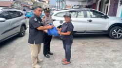 Sambut HUT Humas Polri ke-75, Polres Bitung Salurkan Puluhan Paket Sembako kepada Warga